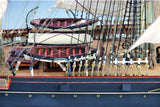 Detailed wooden ship model kit for the Cutty Sark, featuring laser-cut parts, brass accents, and a step-by-step guide.