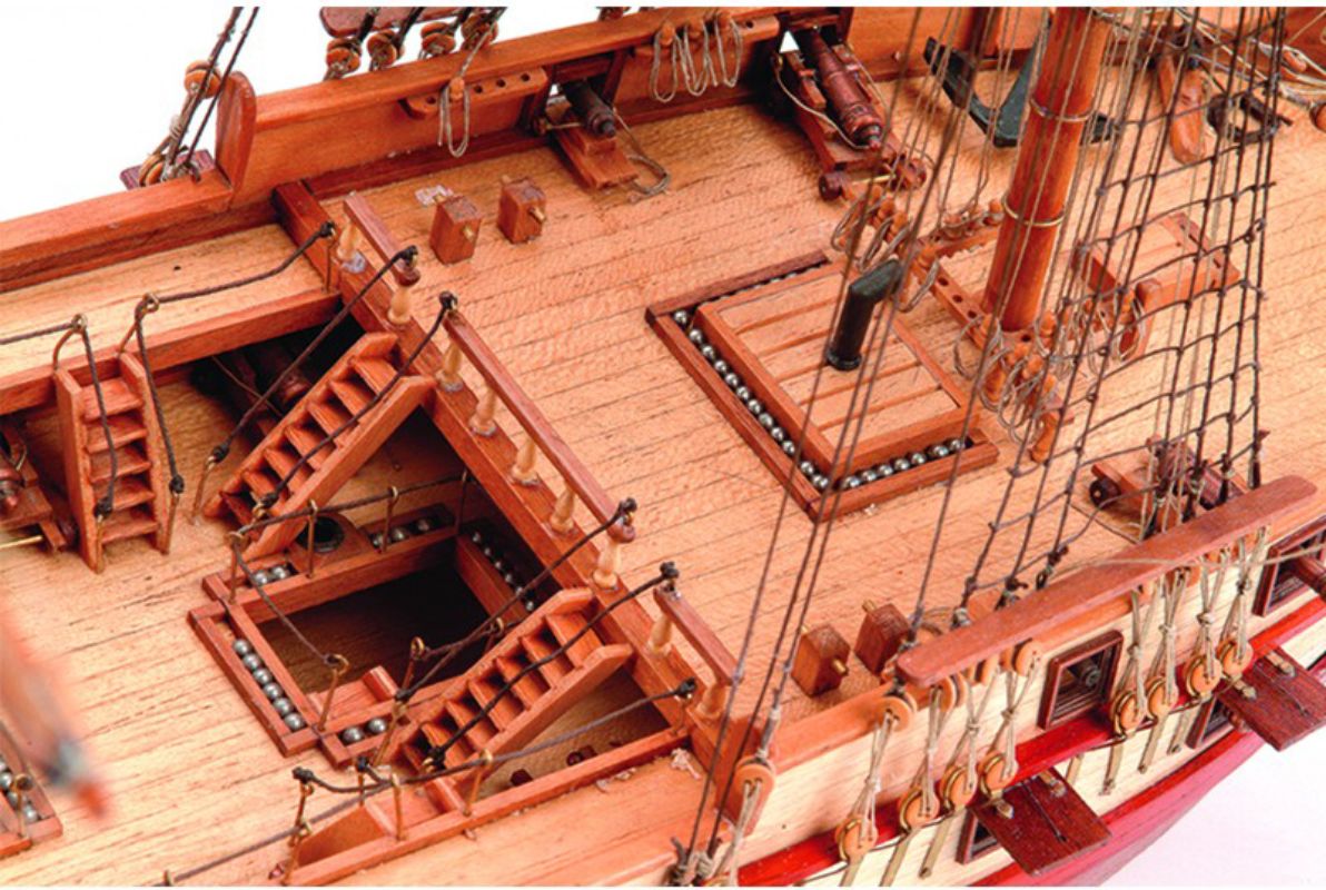 Detailed wooden model kit of USS Constellation Frigate, featuring laser-cut parts and authentic materials for exquisite assembly.