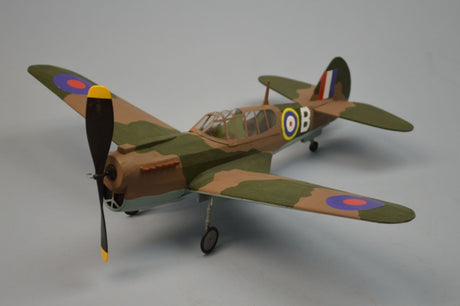 18-inch balsa wood glider modeled after the WWII P-40 Kittyhawk, perfect for outdoor fun and educational play.