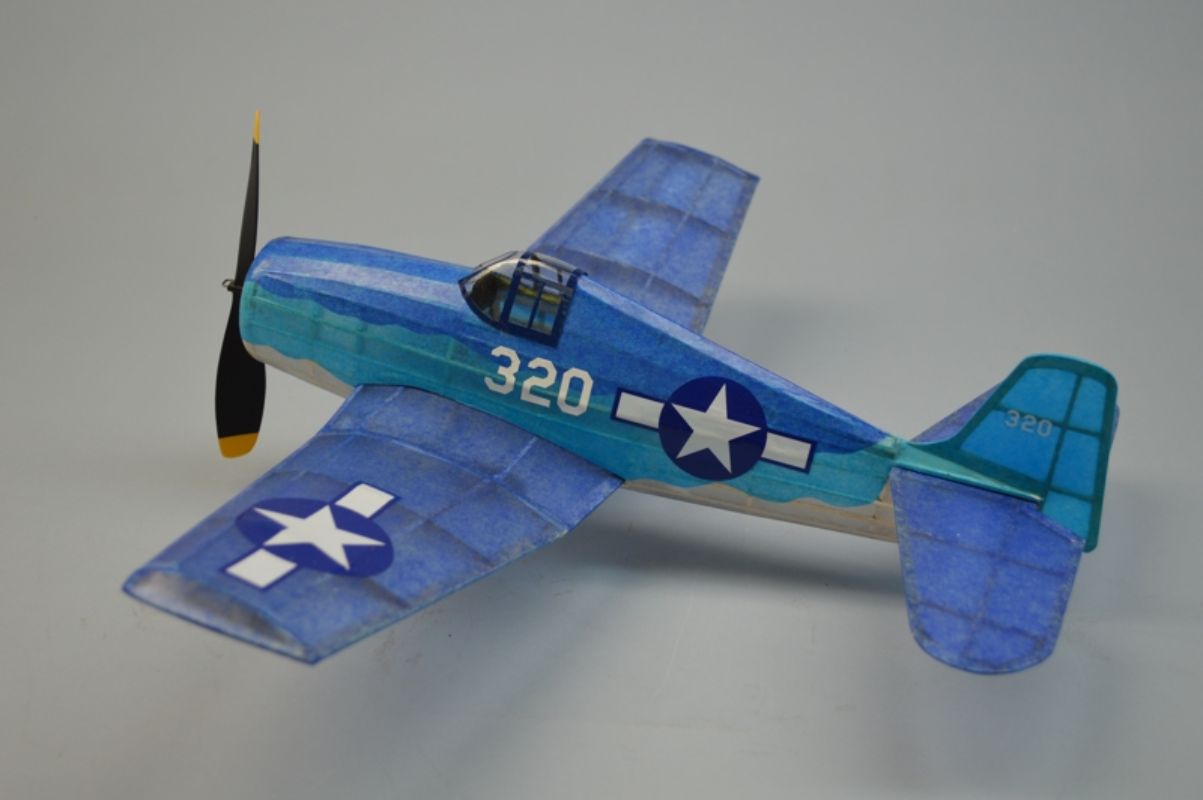 18-inch balsa glider model of WWII F6F Hellcat, featuring laser-cut parts, decals, and a 6-inch propeller for excellent flight.