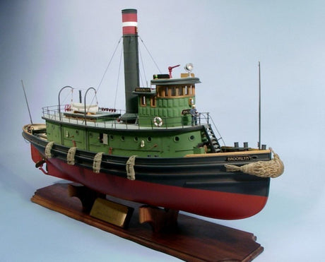 Detailed wooden model kit of the 39 1/2" Brooklyn Tug, compatible with R/C features for an engaging build experience.