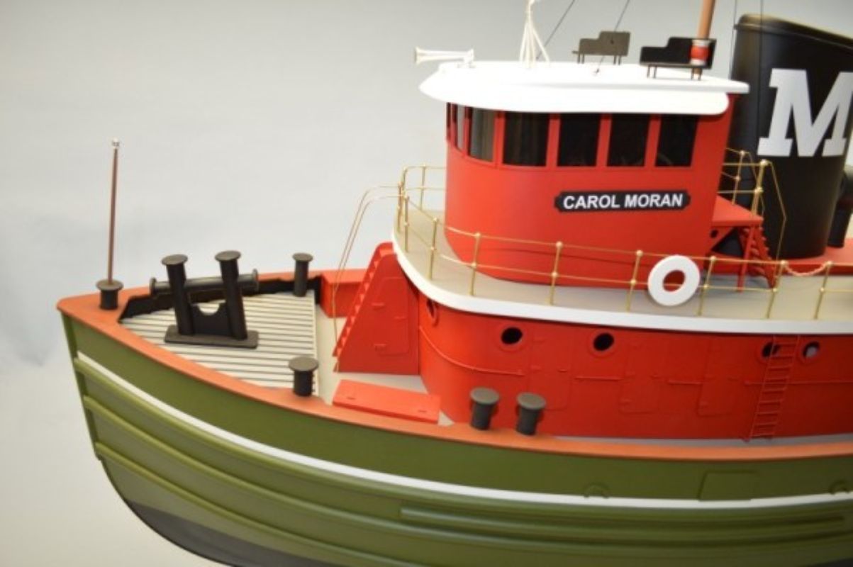 Detailed wooden ship kit of the 50" Carol Moran Tug, perfect for model builders and maritime enthusiasts.