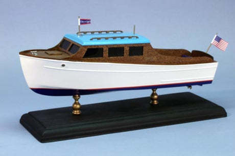 Wooden Ship Kit of the 1935 Chris-Craft 25 ft. Cruiser, crafted from balsa and mahogany, ideal for model-building enthusiasts.