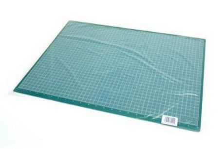 Excel 18" x 24" green cutting mat with grid design, ideal for precise cutting in crafting, sewing, and quilting projects.