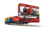 Colorful Hornby Santa's Express train set with steam engine, present wagon, and closed van, perfect for holiday festivities.