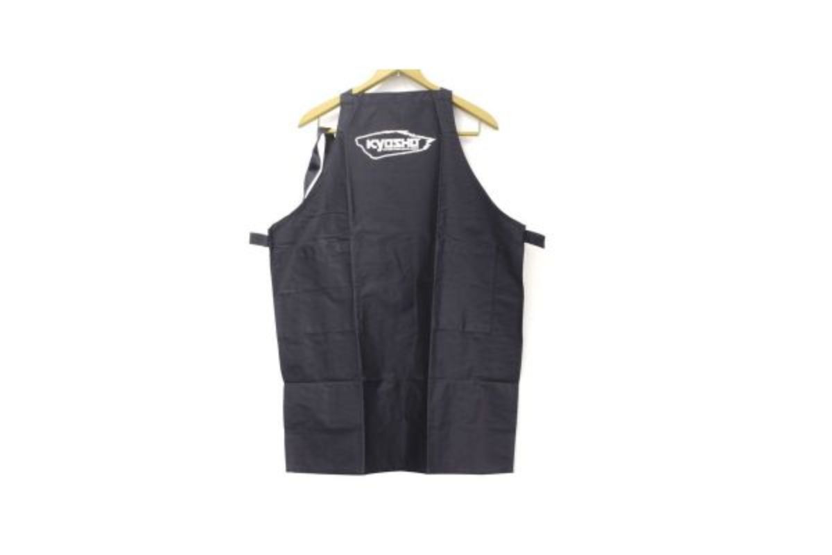 Black Kyosho apron featuring adjustable neck strap, spacious pockets, and durable material for chefs and home cooks.