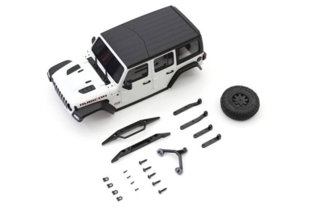 Diecast model of a white Jeep Wrangler, featuring detailed design, realistic wheels, and a finely crafted interior.