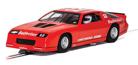 Red Chevrolet Camaro IROC-Z #12 slot car, 1/32 scale, featuring detailed design, Magnatraction, and digital plug-ready upgrade.