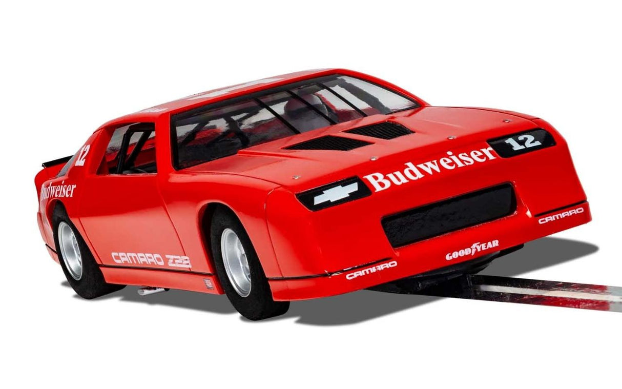 Slot car replica of the red Camaro IROC-Z #12, featuring high detail, Magnatraction, and digital plug-ready technology.