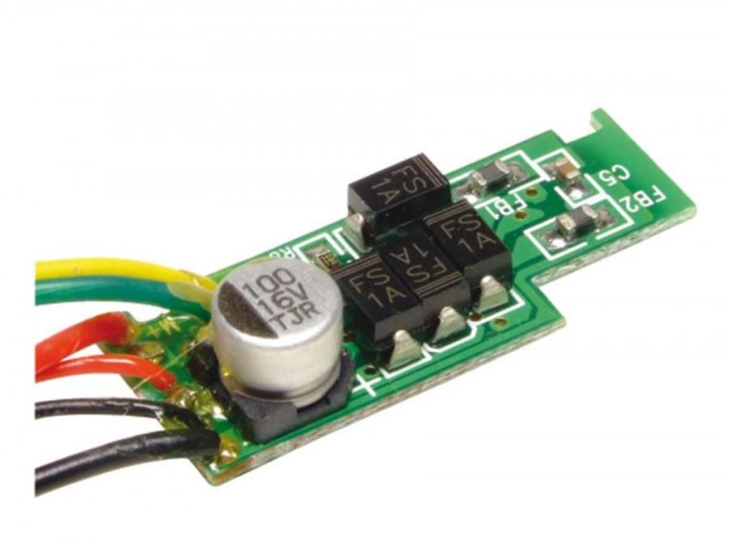 Digital microprocessor for Scalextric cars, enabling conversion to digital racing on Scalextric layouts since 1957.