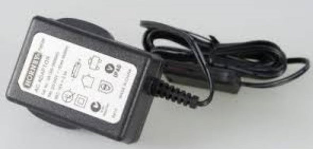 Scalextric Analog Power Supply with 19v 0.5a output and spade plug, essential for optimal slot car racing performance.