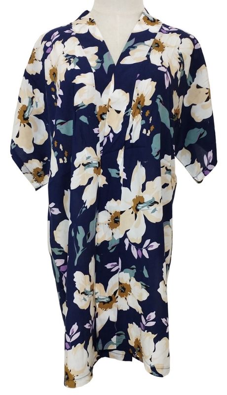 Navy Gabby Large Flower Kimono features vibrant floral design, 100% viscose, and a flattering fit for versatile styling.