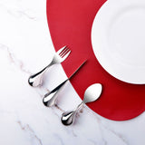 Ergonomic stainless steel fork with a unique ball handle for comfortable grip, designed for easy dining with limited wrist motion.