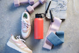 Stylish coral stainless steel bottle, 900ml, insulated for hot or cold drinks, with a wide mouth and easy open spout.