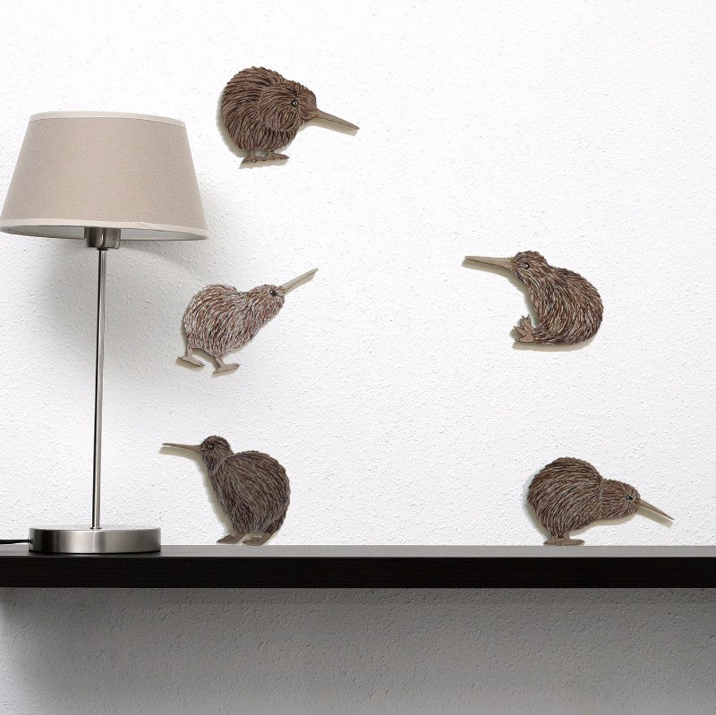 Kiwiana Wall Art set featuring five Kiwi bird designs printed on durable brushed silver for stylish home decor.