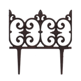 Elegant Fleur-de-lis lawn fence set for delineating garden spaces, made of durable cast iron, self-staking for easy setup.