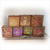 Koru LED Tealight Candle Box in bamboo veneer with color-changing LED, ideal for decor and safe ambiance.