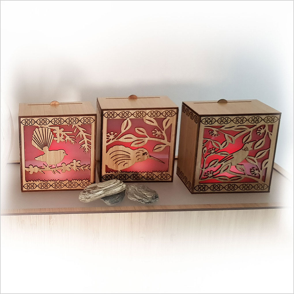 Koru LED Tealight Candle Box in renewable bamboo, featuring 7 color-changing LED candles and wall mounting option.