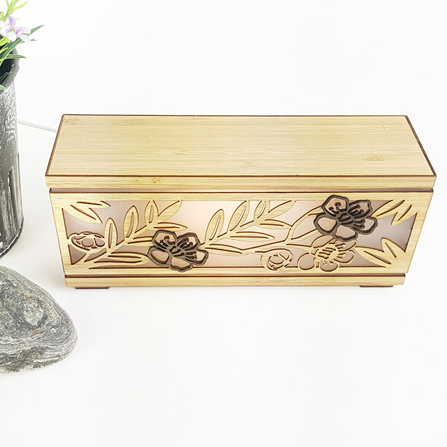 LED Tealight Box in bamboo veneer, USB powered, emitting warm light; perfect for children's rooms and modern decor.