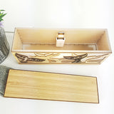 LED tealight box made from renewable bamboo, emits a warm glow; ideal nightlight for kids and calming decor solution.