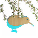 "Hanging Kiwi ornament crafted from bamboo and teal acrylic, featuring a laser-cut design, perfect for home decor."