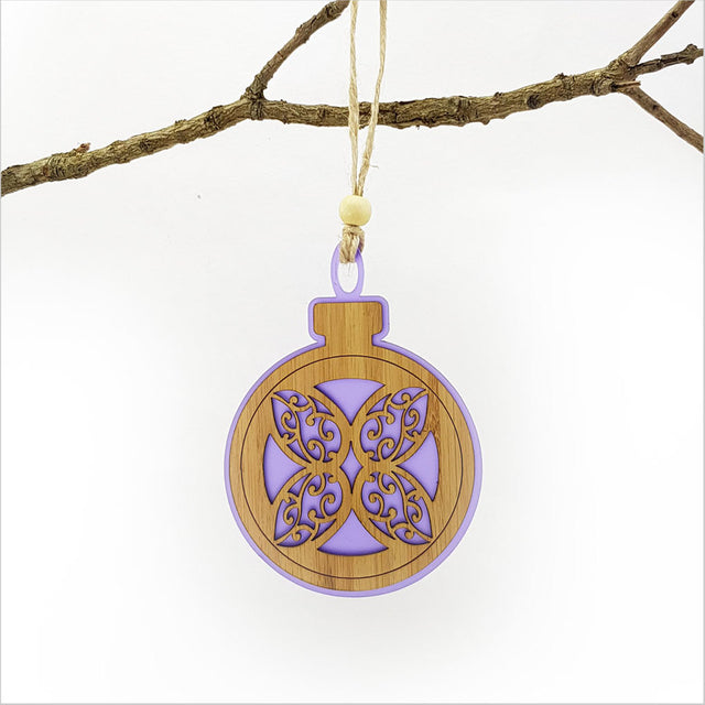 Elegant purple satin acrylic bauble with laser-cut flower design, perfect for holiday and home decoration.