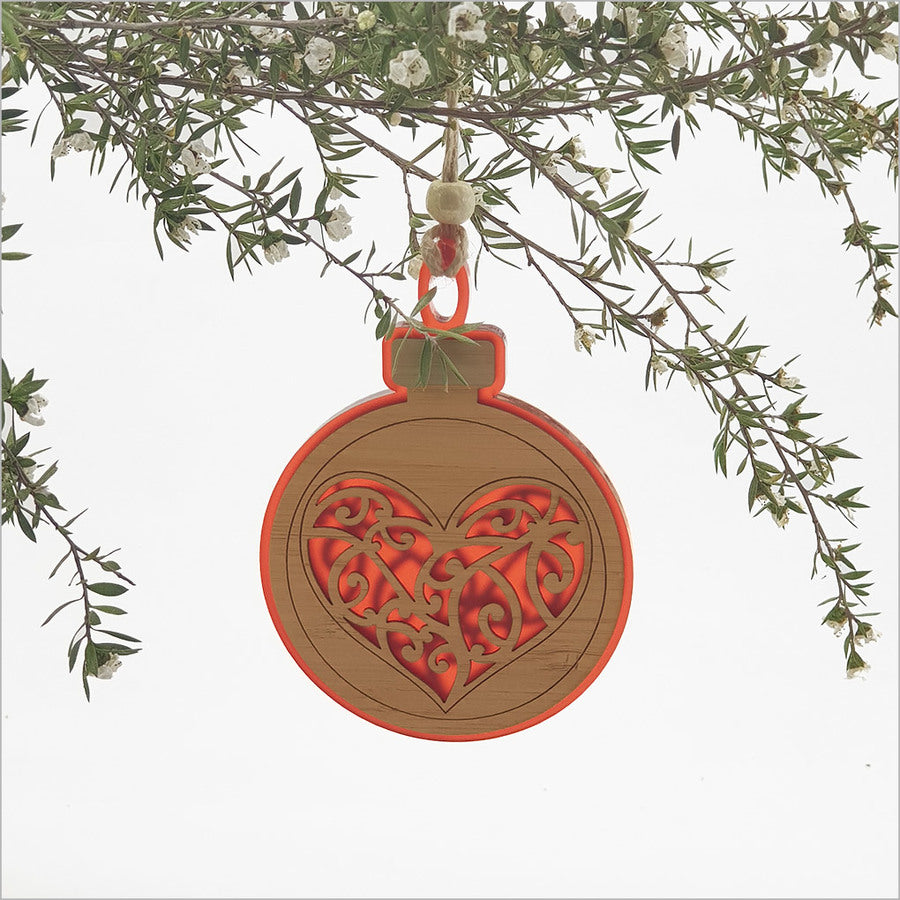 Red satin acrylic heart-shaped hanging ornament, laser-cut design, perfect for holiday decor or gifting.