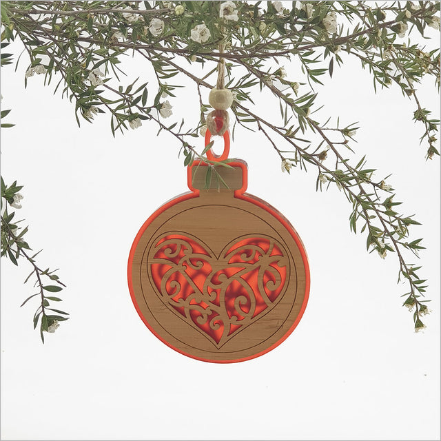 Red satin acrylic heart-shaped hanging ornament, laser-cut design, perfect for holiday decor or gifting.