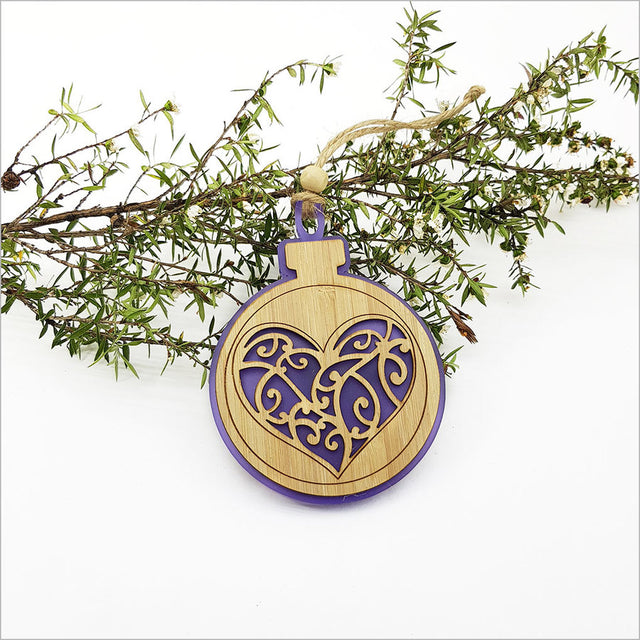 Heart-shaped purple satin acrylic bauble ornament, perfect for home decor and holiday celebrations, lightweight and durable.