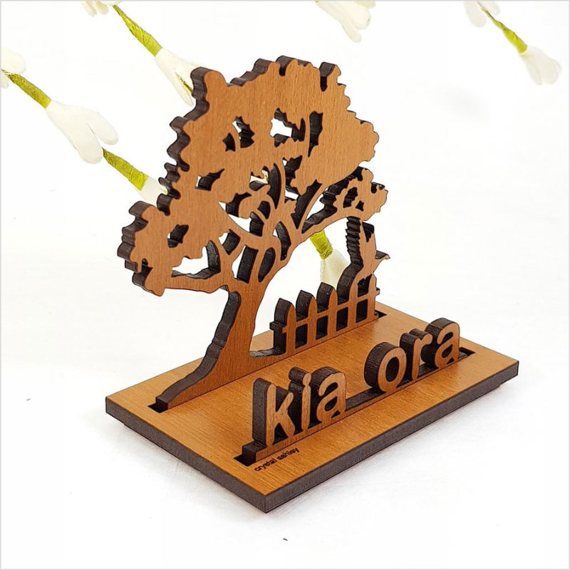 Kia Ora card holder made of laser-cut NZ veneer, featuring a tree design, perfect for organizing cards stylishly.