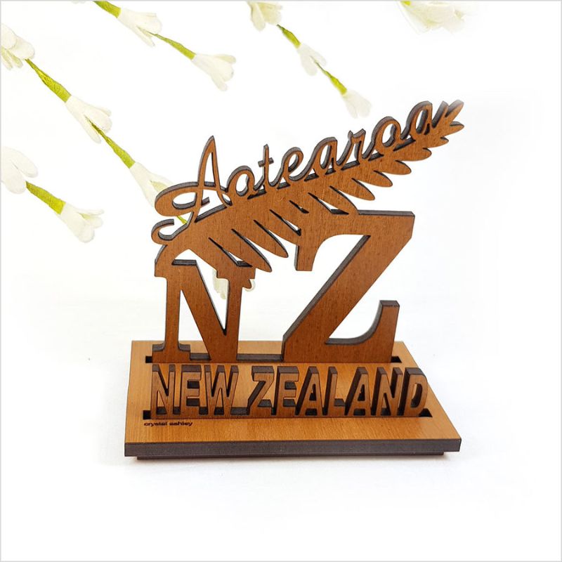 Elegant silver fern card holder made from NZ veneer, perfect for organizing business and ID cards, measuring 9cm.