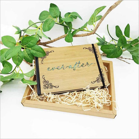 Large eco-friendly guest book journal with bamboo cover, Paua accents, and 128 acid-free pages for memories and creativity.