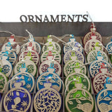 Teal satin acrylic hanging ornament featuring a laser-cut bamboo design, perfect for festive tree decor or gifts.