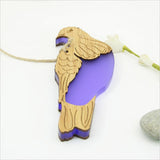Hanging bamboo ornament featuring a Kereru bird design, vibrant purple satin acrylic, eco-friendly, and perfect for home decor.