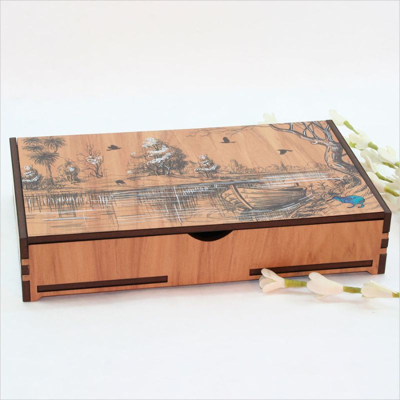 Elegant rectangular trinket box with NZ veneer and paua inlay, perfect for organizing jewelry and keepsakes.