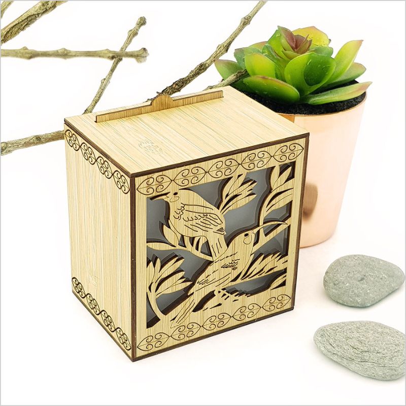LED Tealight Candle Box - Huia featuring laser-cut bamboo veneer, color-changing LED, and keyhole for wall hanging.