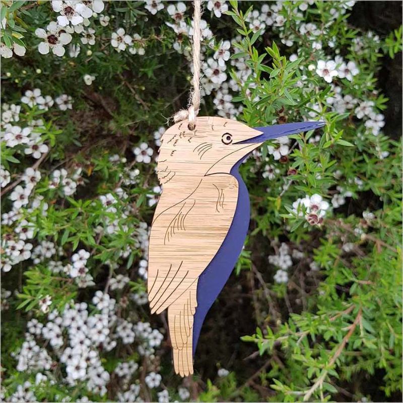 Hanging Kingfisher ornament features laser-cut bamboo and blue satin acrylic, perfect for eco-friendly home decor.