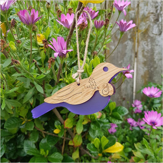 Hanging Ornament - Tui crafted from bamboo and purple satin acrylic, featuring intricate details and ready to hang.