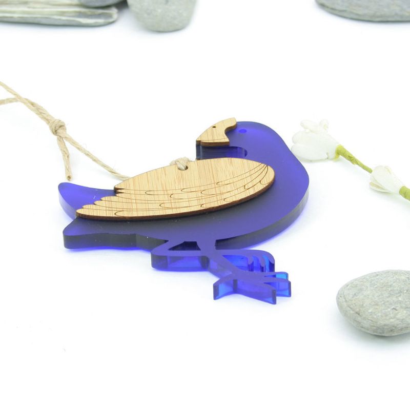 Hanging Pukeko ornament made of laser-cut bamboo and blue satin acrylic, perfect for holiday decor or gifting.