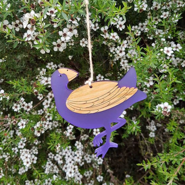 Whimsical Pukeko hanging ornament in bamboo and purple satin acrylic, perfect for home decor and gifting.
