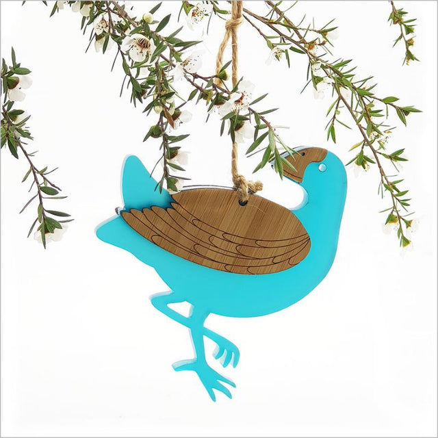 Vibrant teal satin acrylic Pukeko ornament from bamboo, perfect for home decor or as a thoughtful gift, ready to hang.