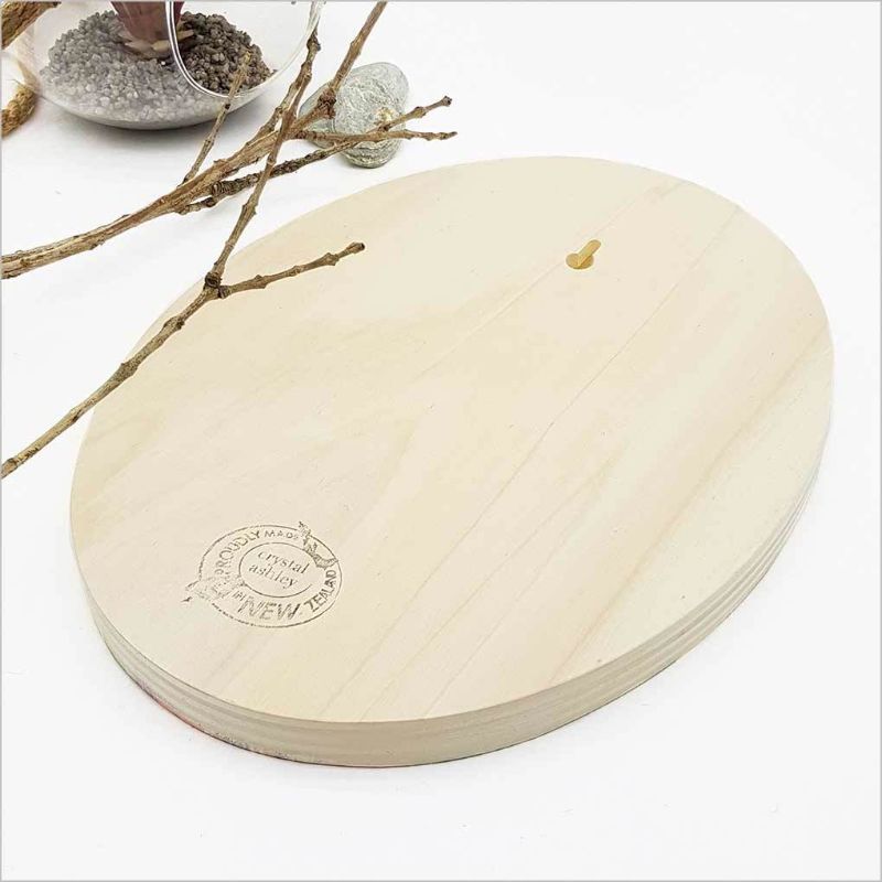 Wall art featuring Sarah Featon's Pohutukawa, crafted from eco-friendly pine ply, measuring 28 cm and ready to hang.