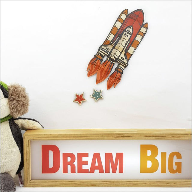 Pine Wall Art Space Shuttle Set features a 27cm shuttle and two stars, crafted from eco-friendly pine veneer.