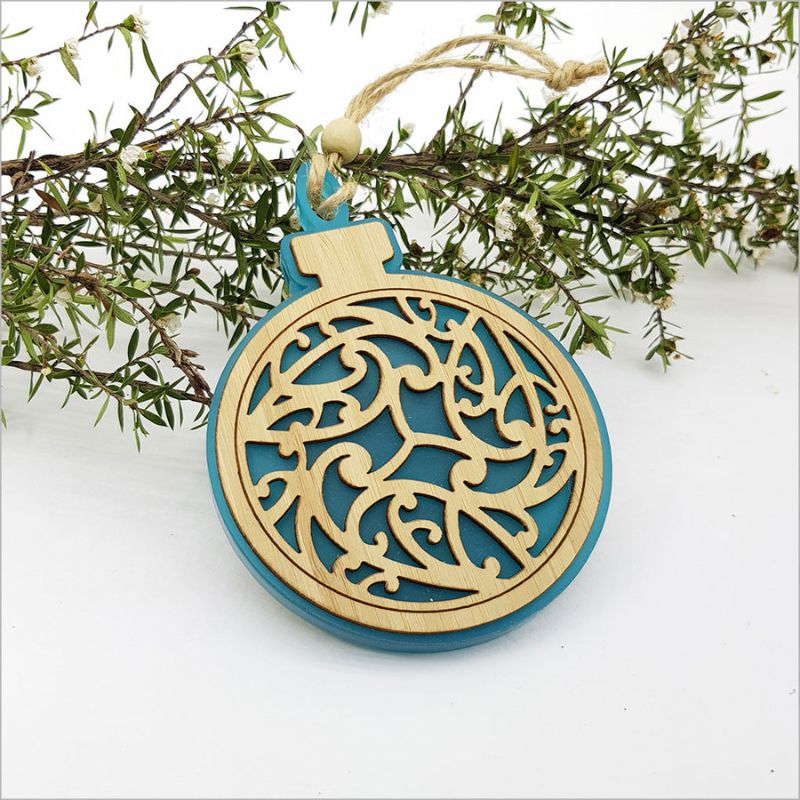 Teal satin acrylic hanging ornament featuring a laser-cut bamboo design, perfect for festive decor and gifting.