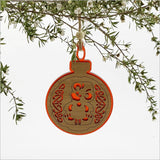 Red satin acrylic hanging ornament featuring a tiki design with laser-cut bamboo, perfect for festive decor and gifting.