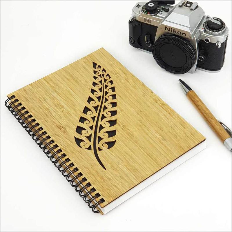 Eco-friendly bamboo journal featuring a fern design, perfect for travel, journaling, and sketching with luxurious 110gsm paper.