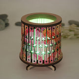 Round LED tealight holder in Bright Pacific, featuring vibrant color-changing LED, crafted from elegant laser-cut veneer.