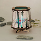 Round LED tealight holder with vibrant floral kiwi design, 8.5cm, includes color-changing LED candle for elegant decor.