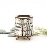 Round LED tealight holder with floral design, 85mm diameter, includes color-changing LED candle for stylish, safe illumination.