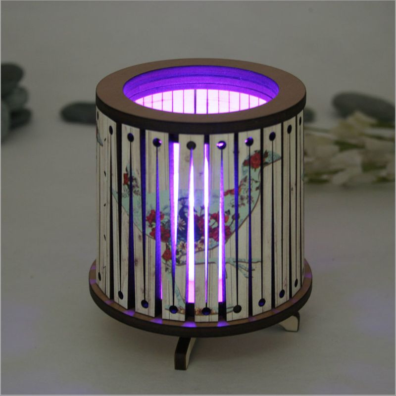 Round LED tealight holder featuring floral design and color-changing LED, perfect for home decor and cozy atmospheres.